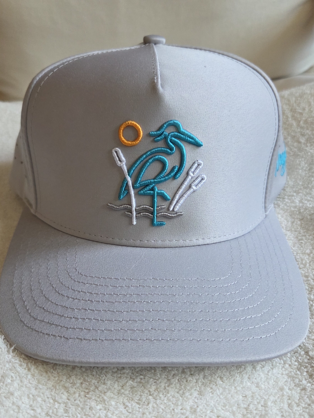Waggle Embroidered Heron Snapback Hat in Light Gray with Teal & Yellow Accents